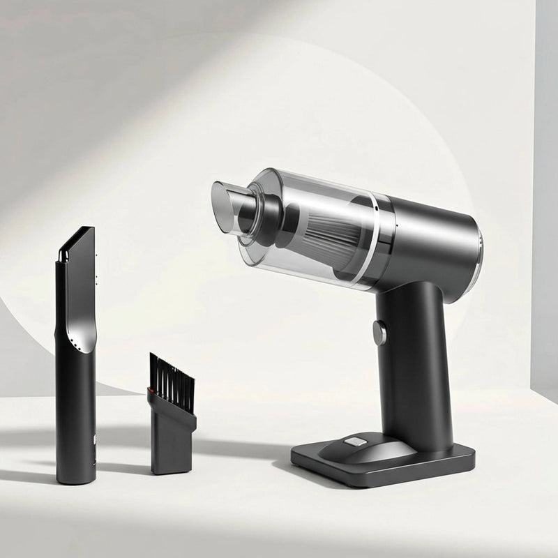 Silver handheld vacuum cleaner with attachments on a light gray background